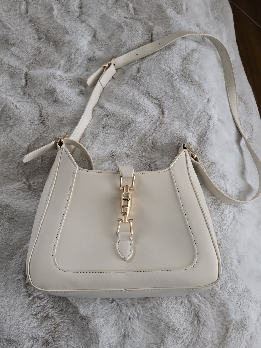 Elegant Cream Shoulder Bag with Gold Accent Hardware